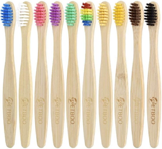 Bamboo toothbrush with soft charcoal bristles and colorful handle.