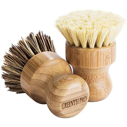 Two bamboo dish brushes with natural bristles.