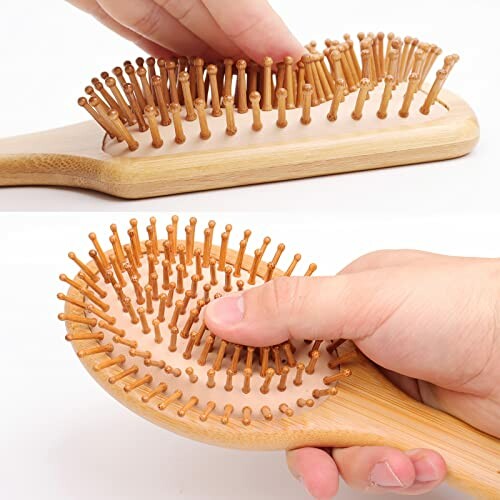 Person using a bamboo hair brush with wooden bristles.