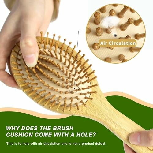 Bamboo hairbrush with a hole for air circulation.