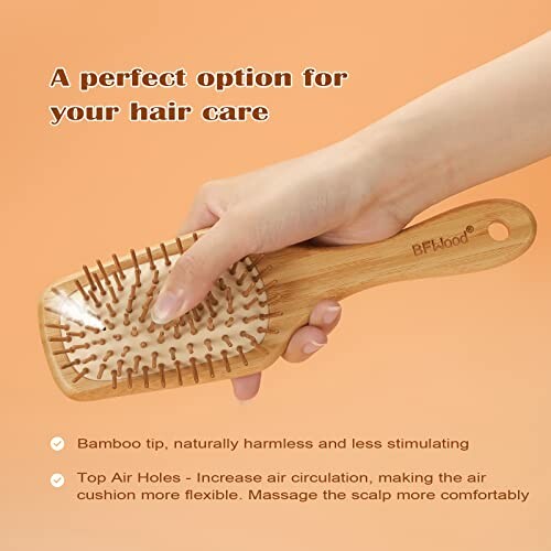 Hand holding a bamboo hairbrush with air cushion and text about hair care benefits.