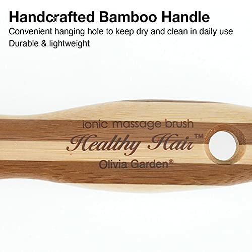 Handcrafted bamboo handle of a massage brush with brand engraving.