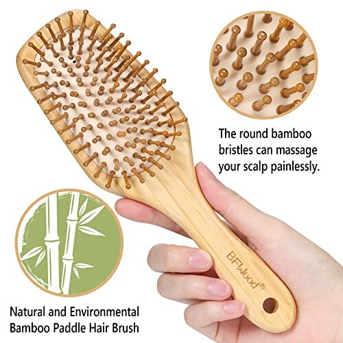 Bamboo paddle hair brush with round bamboo bristles.