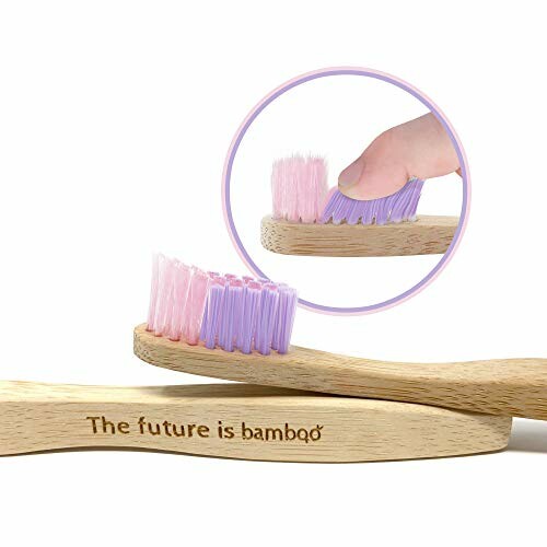 Bamboo toothbrush with soft pink and purple bristles.