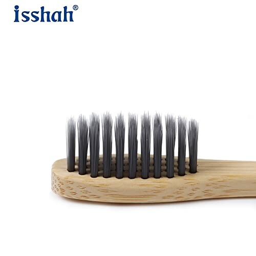 Bamboo toothbrush with black bristles.