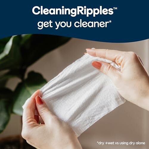 Hands holding a textured wet wipe with CleaningRipples branding.