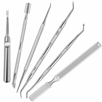 Set of five stainless steel dental tools.