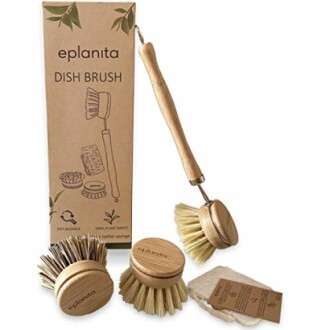 Eco-friendly dish brush set with wooden handles and natural bristles.