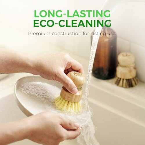 Person using eco-friendly dish scrubber under running water.