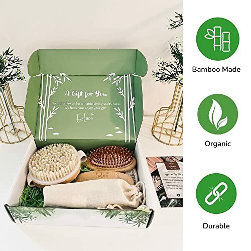 Sustainable gift box with bamboo and organic items including brushes and a cloth pouch.