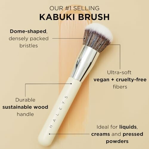 Kabuki brush with features labeled: dome-shaped bristles, vegan fibers, wood handle.