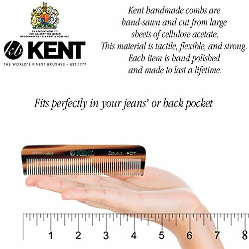 Hand holding a Kent handmade pocket comb.