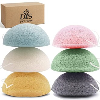 Set of colorful konjac facial cleansing sponges with a box.