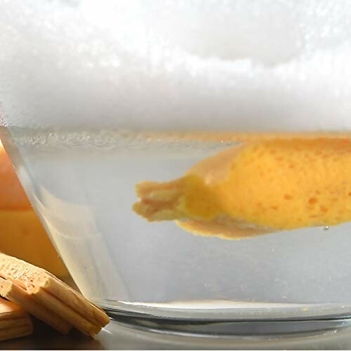 Close-up of a lemon slice in a glass of water.