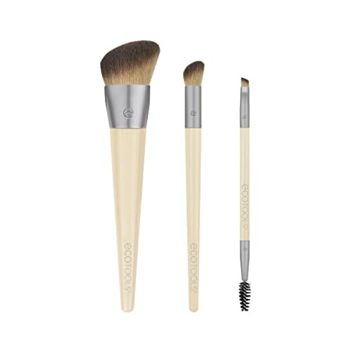 Set of three EcoTools makeup brushes with wooden handles.