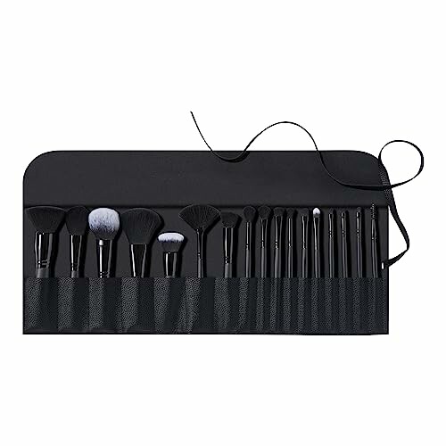 Set of black makeup brushes in a case