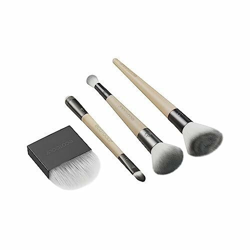 Set of four makeup brushes with wooden handles