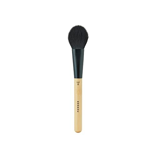 A makeup powder brush with a wooden handle