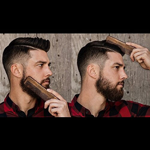 Man grooming beard with comb in front of wooden background.