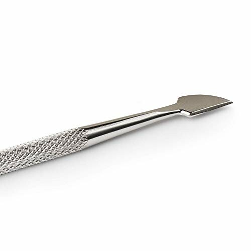 Metal nail cuticle pusher tool.