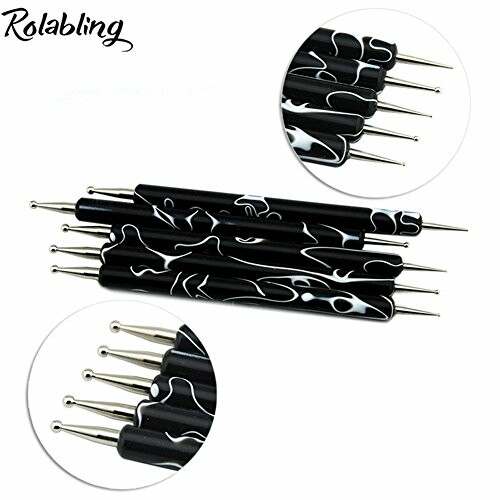 Set of black and white nail art dotting tools with various tip sizes