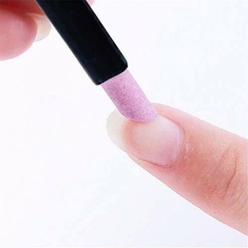 Close-up of a pink nail buffer used on a fingernail.