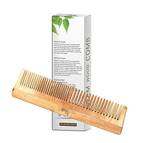 Neem wood comb with packaging.