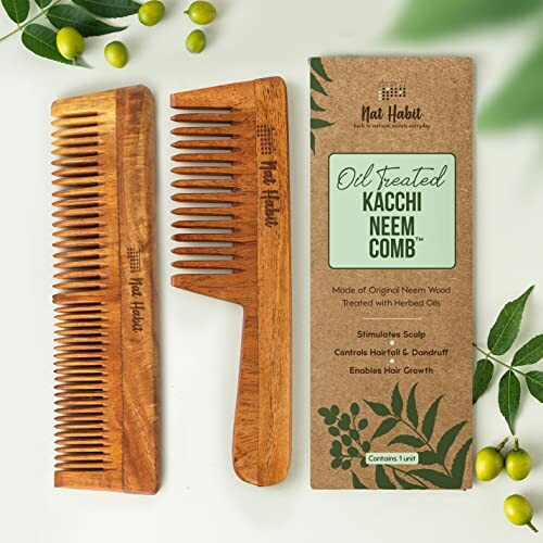 Neem wood comb set with packaging and leaves.