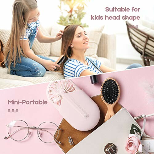 Child brushing woman's hair and portable fan with accessories on table.