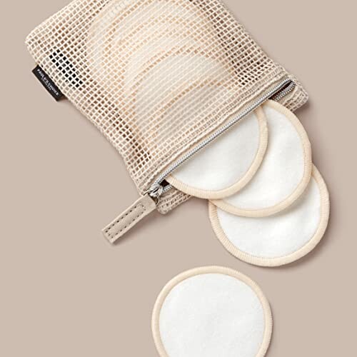 Reusable cotton pads in a mesh bag.