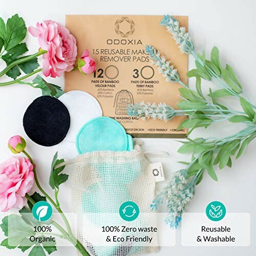 Eco-friendly reusable makeup remover pads with packaging and flowers.