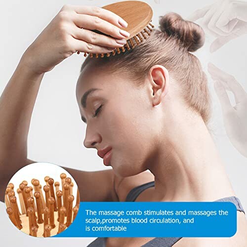 Person using a wooden massage comb on scalp