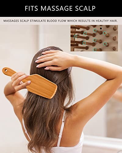 Woman using bamboo hairbrush for scalp massage.