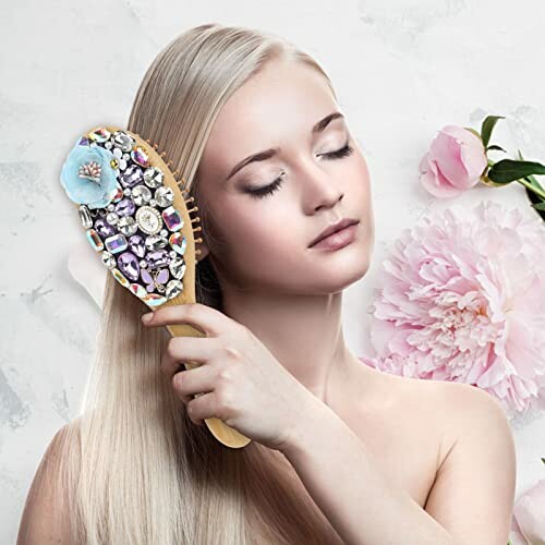 Woman brushing hair with decorative brush and flowers in background.