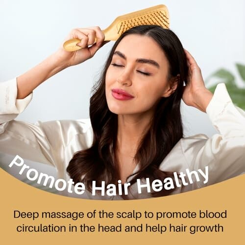 Woman brushing hair with wooden brush for healthy hair growth