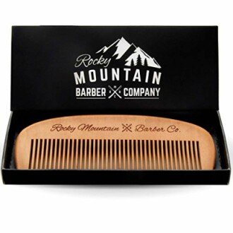 Wooden beard comb from Rocky Mountain Barber Company in box.