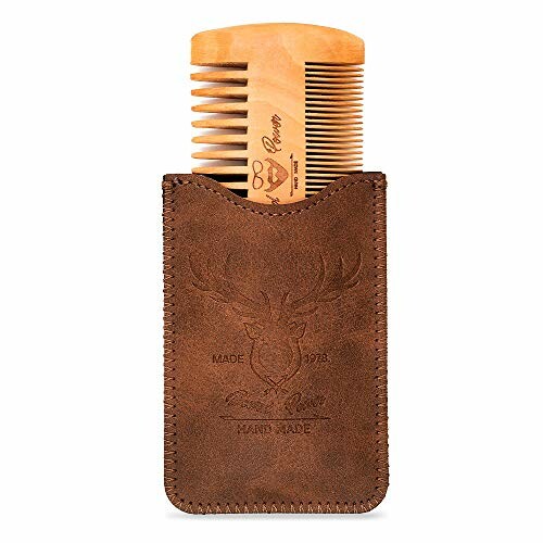 Wooden beard comb in a leather case with engraved deer design.