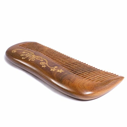 Decorative wooden comb with floral design