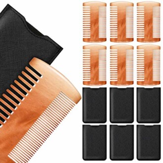 Set of wooden combs with protective cases.