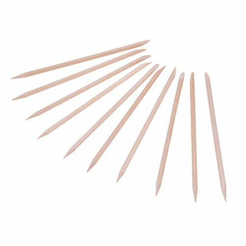 Set of wooden cuticle sticks with pointed ends.