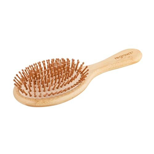 Wooden hair brush with bristles and handle