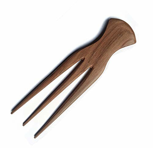 Wooden hair fork with three prongs.