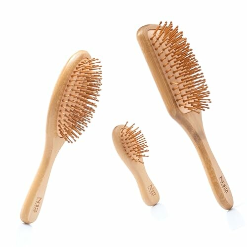 Set of three wooden hairbrushes with bristles