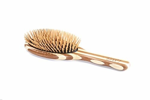 Wooden hairbrush with natural bristles and non-melting pins