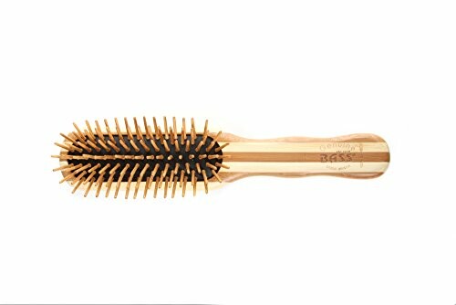 Image of a wooden hairbrush with wooden bristles on a white background, showcasing its natural and eco-friendly design